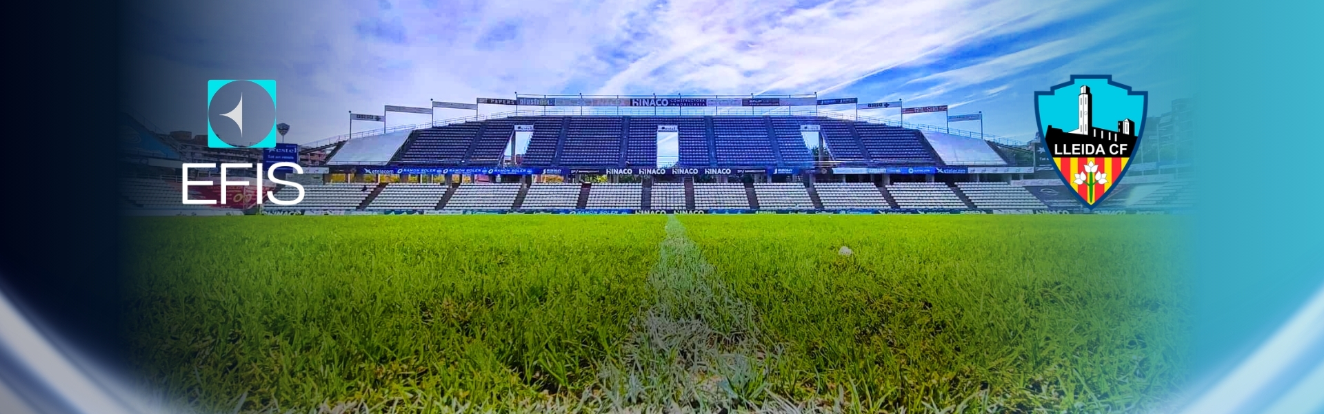 Stadium view with grass foreground.